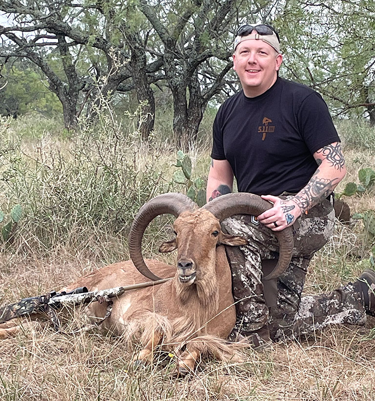 happy veteran with Barbay sheep