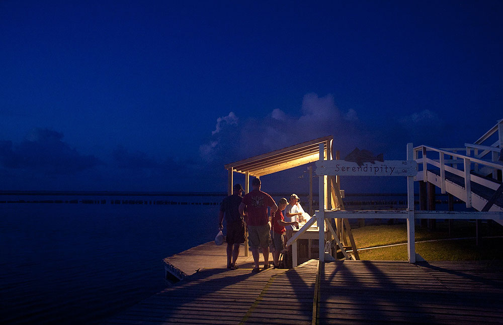 fishing group on a scenic dock