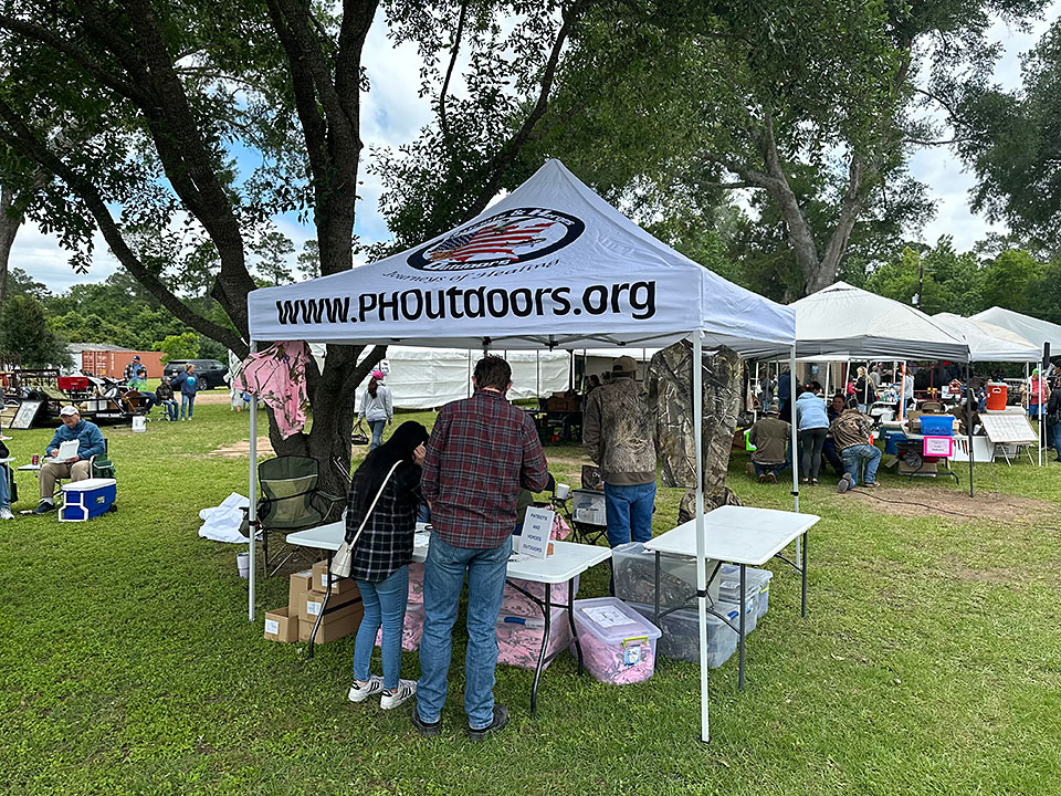 Patriots & Heroes outdoor tent at event