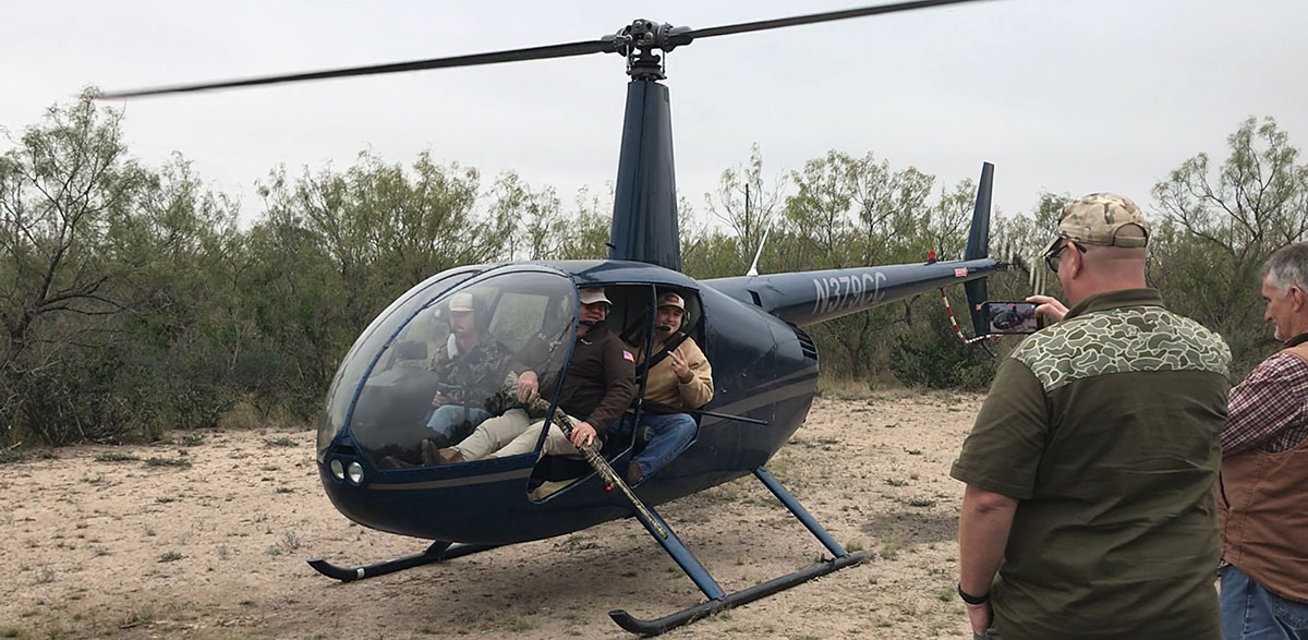 happy veterans in chopper