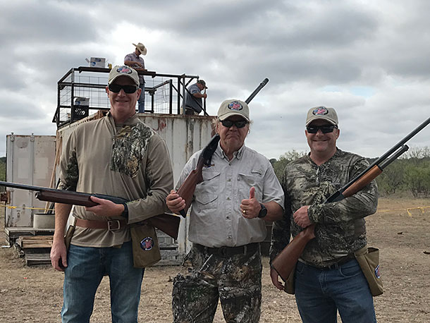 three happy veterans friends