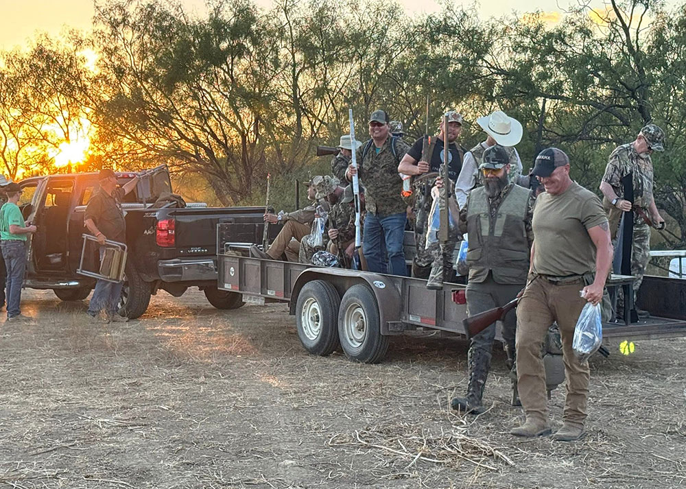 happy hunting group embarking at dawn